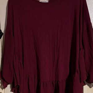 Elegant Maroon Women’s tunic with a sheered ruffled bottom and sheered sleeves